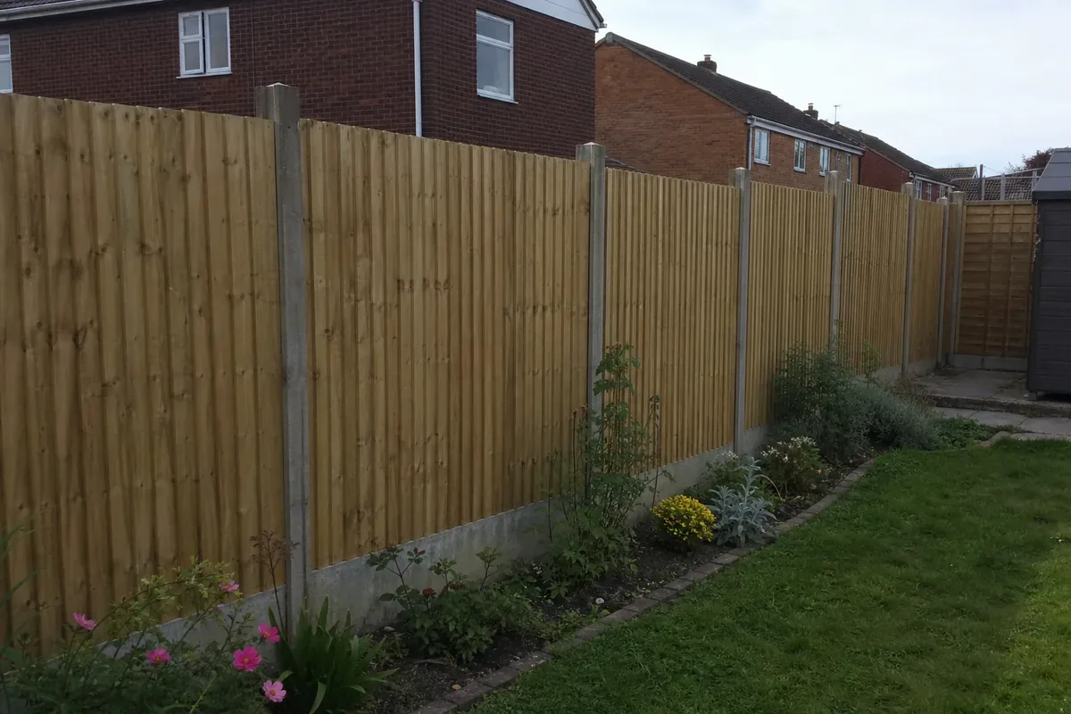New feather edge rear garden fencing in Longton with concrete posts