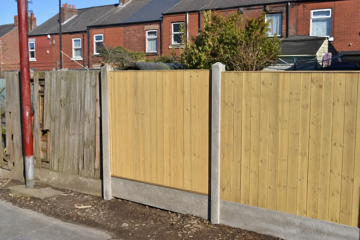 Fence repair work replacing storm-damaged panels in Burslem